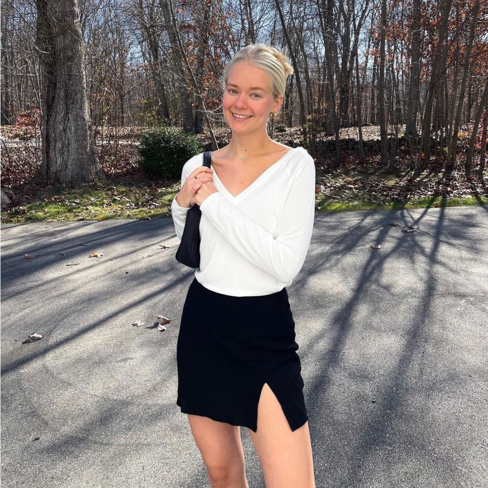 Black mini skirt with slit, size 4, from beginning boutique